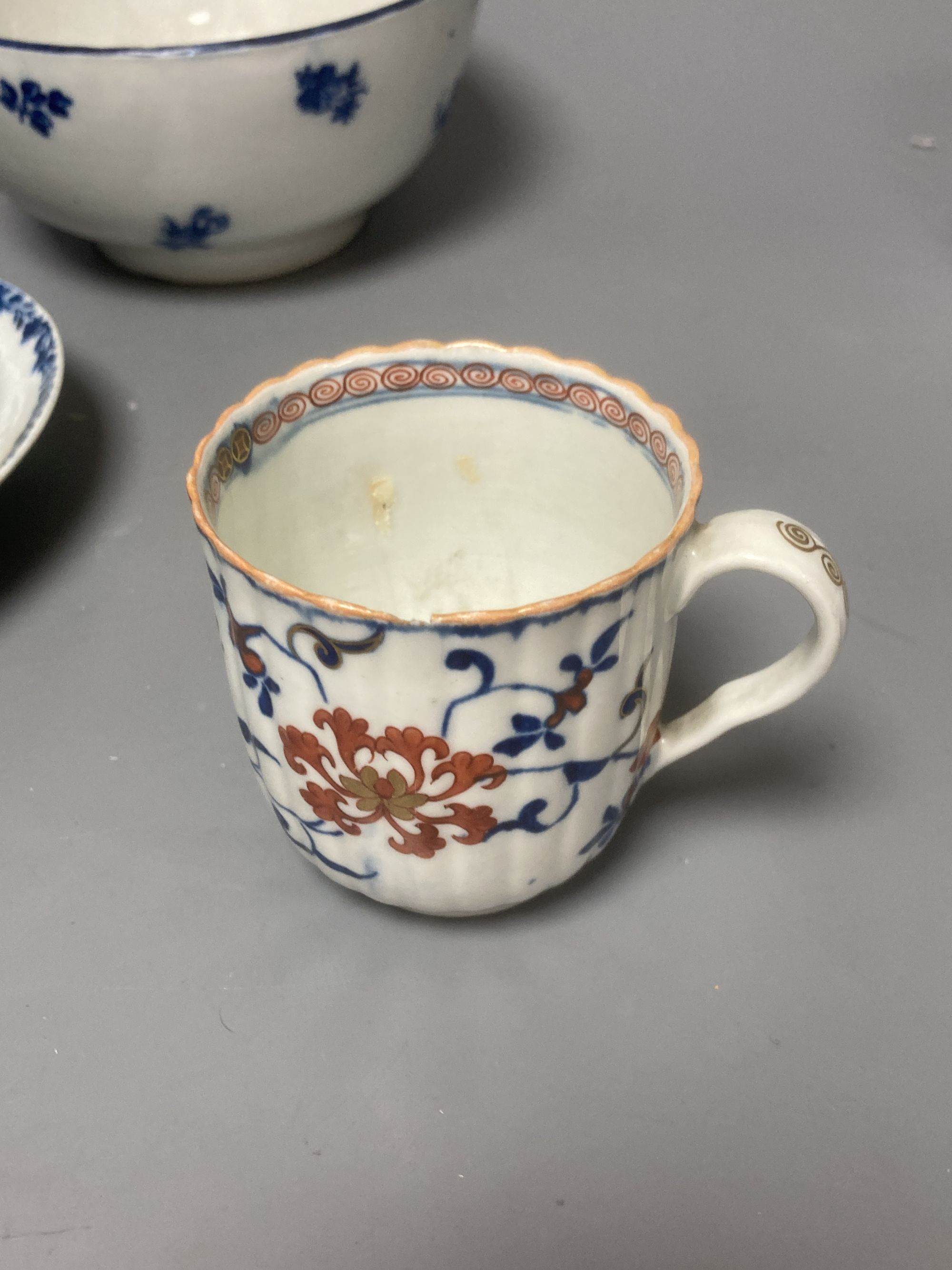 A group of Worcester blue and white ceramics, a Japan pattern cup and a Samson blue and white saucer, tallest 8cm